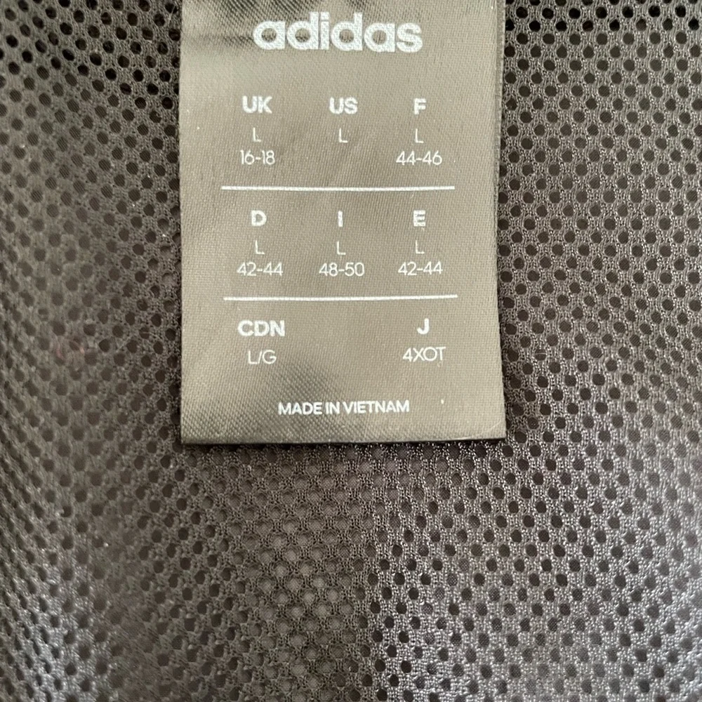 Adidas women’s windbreaker jacket black